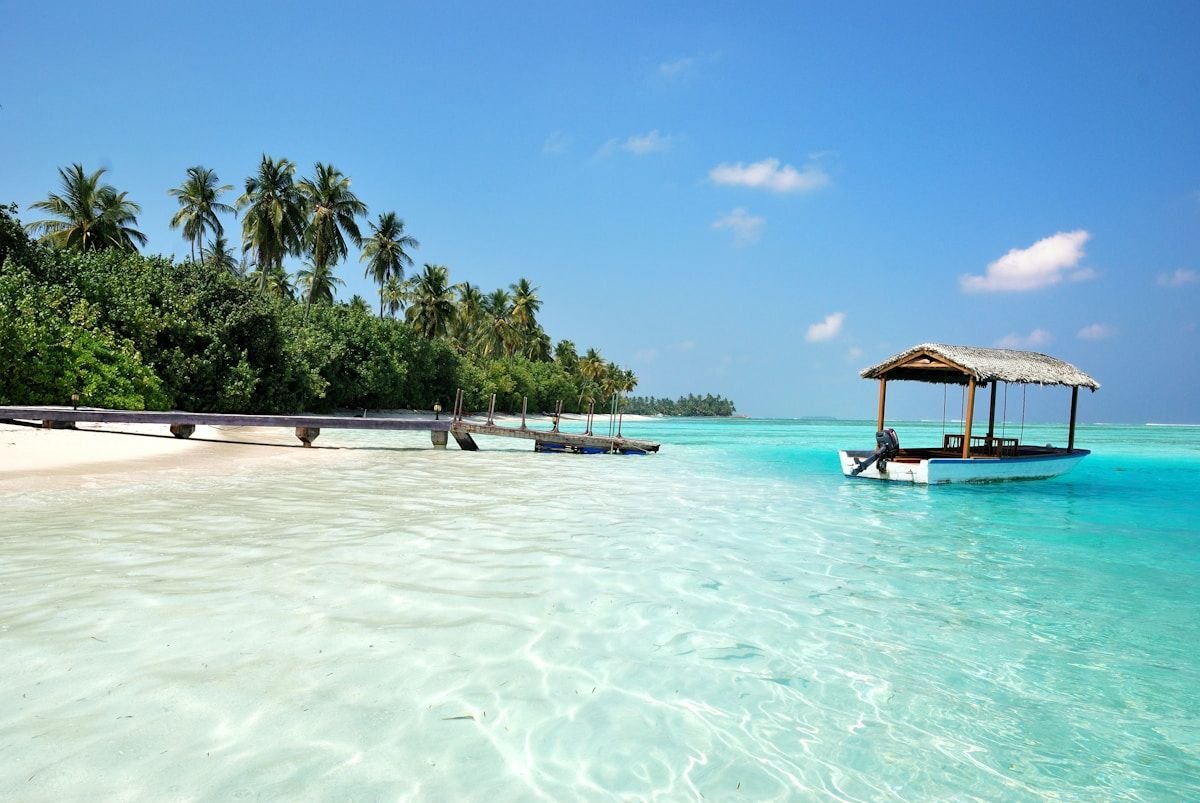 Best Caribbean Holiday Destinations — Complete Island Travel Guide Caribbean sunset ocean boats islands golden hour tropical paradise