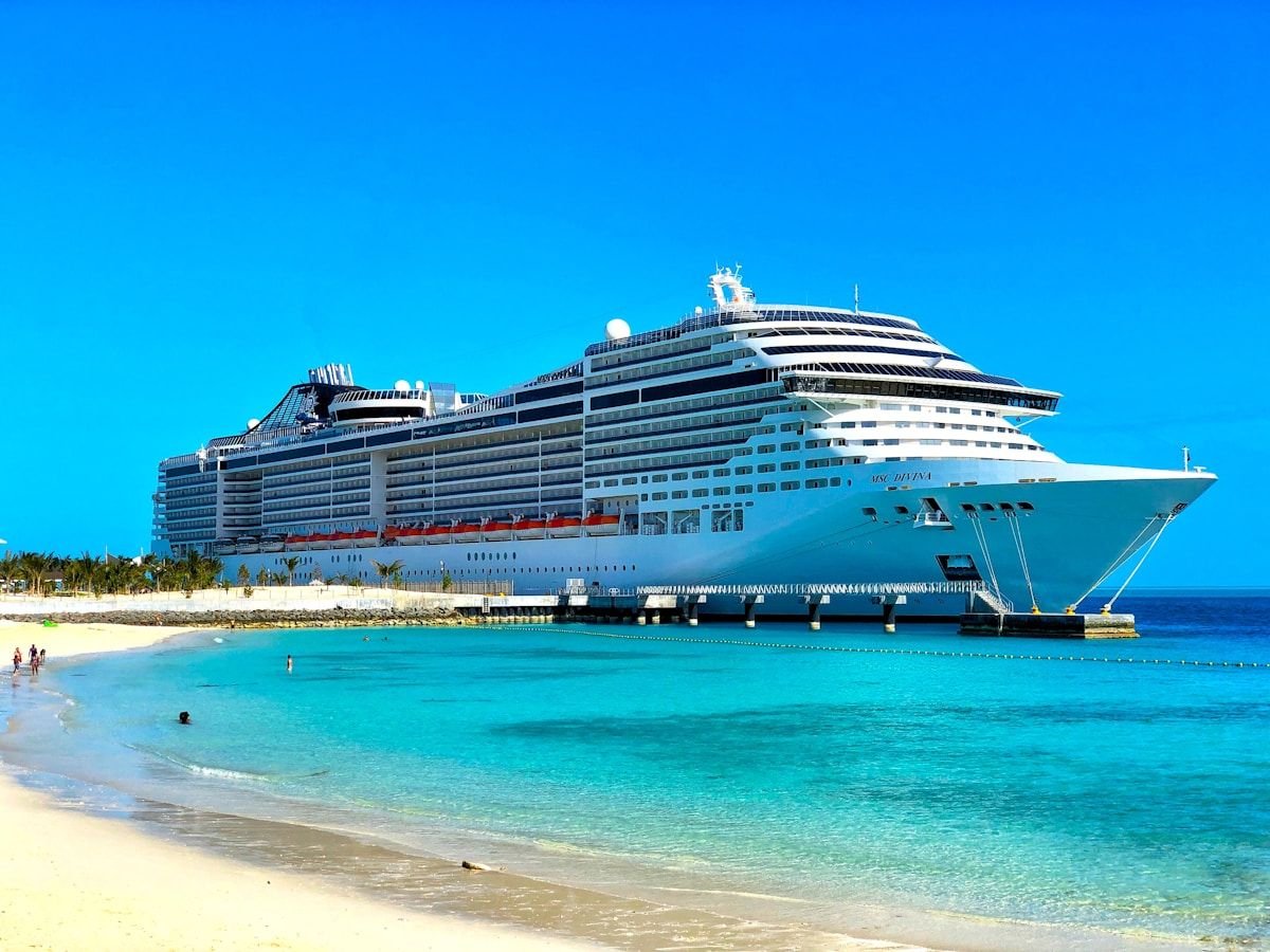 Luxury Cruise Holidays: 3 Things You Must Know Before Booking Cruise ship deck pool sunset sea luxury outdoor relaxation